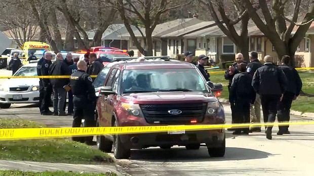 Emergency personnel on the scene of a home invasion and stabbing in Rockford, Illinois, on Wednesday, March 27.
Mandatory Credit:	WREX via CNN Newsource