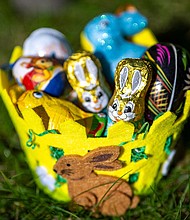 An Easter basket filled with chocolate figures and decorative eggs sits in a garden on March 18, in Berlin, Germany.
Mandatory Credit:	Monika Skolimowska/dpa/picture alliance/Getty Images via CNN Newsource