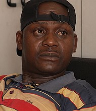 TT Ngwenya, a former cash-in-transit guard, was badly injured when the van he was working on was attacked by a gang in 2021.
Mandatory Credit:	Byron Blunt/CNN via CNN Newsource