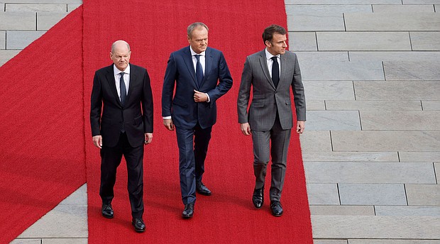 German Chancellor Olaf Scholz, Polish Prime Minister Donald Tusk and French President Emmanuel Macron in Berlin, Germany, March 15.
Mandatory Credit:	Odd Andersen/AFP/Getty Images via CNN Newsource