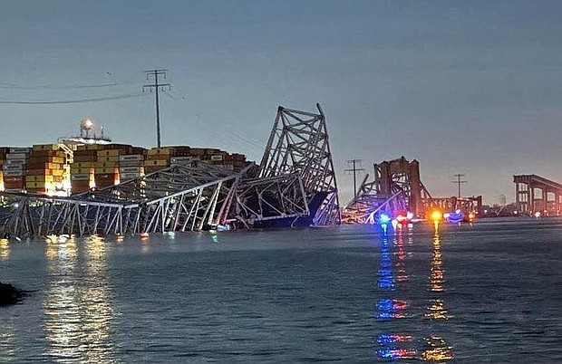 The Francis Scott Key Bridge lies in shambles after a massive cargo ship crashed into one of its pillars overnight in Baltimore.
Mandatory Credit:	Harford County MD Fire & EMS/Reuters via CNN Newsource