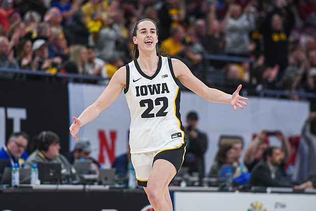 Caitlin Clark of the Iowa Hawkeyes reacts after breaking the NCAA single-season three-point shot record on March 8, in Minneapolis.
Mandatory Credit:	Aaron J. Thornton/Getty Images via CNN Newsource