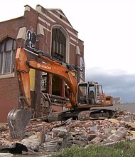 A historic building in Salt Lake City has become the focal point of controversy as demolition commenced on Easter morning, sparking outrage among residents.
Mandatory Credit:	KSTU via CNN Newsource