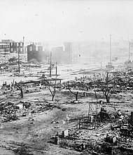 The Greenwood neighborhood is seen in ruins after a mob passed during the race massacre in Tulsa, Oklahoma, U.S., June 1, 1921.
Mandatory Credit:	American National Red Cross/Library of Congress/Reuters via CNN Newsource