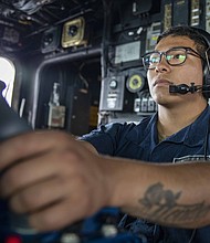 Gunner’s Mate 3rd Class Robert Mora, from Houston,Texas
Photo by Petty Officer 1st Class Jamaal Liddell 
Commander, Task Force 71/Destroyer Squadron 15