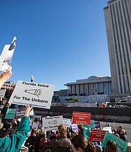 Abortion rights proponents and anti-abortion activists voice their opinions outside the Florida Supreme Court on February 7, in Tallahassee, Florida. The Florida Supreme Court upheld Florida’s existing 15-week ban on abortions, which means the state’s six-week ban will soon become law.
Mandatory Credit:	Alicia Devine/Tallahassee Democrat/USA Today Network via CNN Newsource