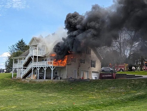 Chief Dennis Fagnant said they could see the smoke from several blocks away and that when they arrived on scene, the home was well involved in the fire.
Mandatory Credit:	WLOS via CNN Newsource