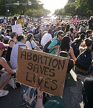 Caption:	Demonstrators gathered near the Texas Capitol following the U.S. Supreme Court's decision to overturn Roe v. Wade. A woman in Texas is suing prosecutors and Starr County for more than $1 million after she was arrested and unlawfully charged with murder for an abortion she had in 2022.
Mandatory Credit:	Eric Gay/AP/File via CNN Newsource