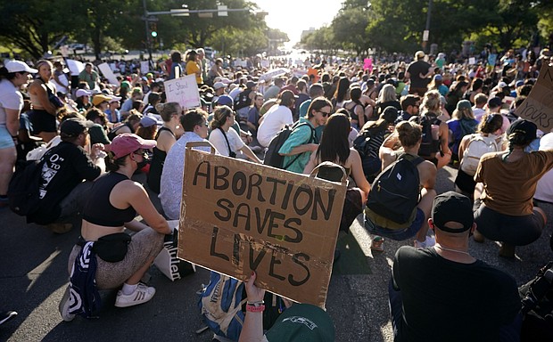 Caption:	Demonstrators gathered near the Texas Capitol following the U.S. Supreme Court's decision to overturn Roe v. Wade. A woman in Texas is suing prosecutors and Starr County for more than $1 million after she was arrested and unlawfully charged with murder for an abortion she had in 2022.
Mandatory Credit:	Eric Gay/AP/File via CNN Newsource