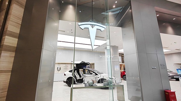 Models of the new energy vehicle series are being displayed at a Tesla store in Shanghai, China, on March 26.
Mandatory Credit:	Costfoto/NurPhoto/Getty Images via CNN Newsource