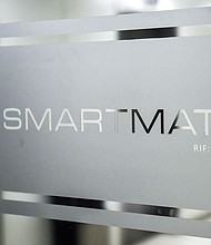 Picture of the logo of Smartmatic. The voting machine company's defamation case against right-wing cable channel Newsmax over the 2020 election has now been scheduled to go to trial in September.
Mandatory Credit:	Ronaldo Schemidt/AFP/Getty Images via CNN Newsource