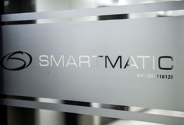 Picture of the logo of Smartmatic. The voting machine company's defamation case against right-wing cable channel Newsmax over the 2020 election has now been scheduled to go to trial in September.
Mandatory Credit:	Ronaldo Schemidt/AFP/Getty Images via CNN Newsource