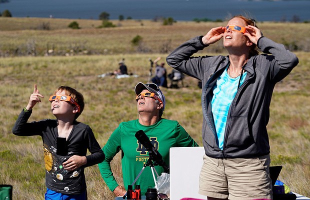 People watch the 2017 total solar eclipse in Guernsey, Wyoming.
Mandatory Credit:	Rick Wilking/Reuters/File via CNN Newsource