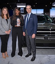 Olabisi Boyle, senior vice president, product planning and mobility strategy, Hyundai Motor North America accepts the Autotrader Best New Cars for 2024 Award from Ken Kraft, chief marketing officer, Cox Automotive, Greta Crowley, vice president of marketing, Cox Automotive at the 2024 New York International Auto Show on Wednesday, March 27, 2024.