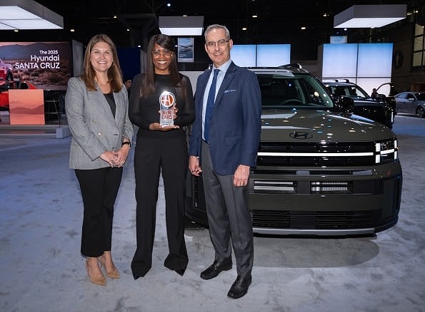 Olabisi Boyle, senior vice president, product planning and mobility strategy, Hyundai Motor North America accepts the Autotrader Best New Cars for 2024 Award from Ken Kraft, chief marketing officer, Cox Automotive, Greta Crowley, vice president of marketing, Cox Automotive at the 2024 New York International Auto Show on Wednesday, March 27, 2024.