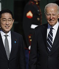 U.S. President Joe Biden poses for photographs with Japanese Prime Minister Kishida Fumio after his arrival at the White House on January 13, 2023 in Washington, DC.
Mandatory Credit:	Chip Somodevilla/Getty Images North America/Getty Images via CNN Newsource