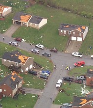 Widespread storm damage is seen in Jeffersonville, Indiana.
Mandatory Credit:	WLKY via CNN Newsource