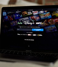 The Disney+ streaming service will start cracking down on password sharing in June.
Mandatory Credit:	Gabby Jones/Bloomberg/Getty Images/File via CNN Newsource