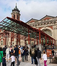 Visitors head into the Ellis Island National Museum of Immigration on October 25, 2022.
Mandatory Credit:	Beata Zawrzel/NurPhotoGetty Images via CNN Newsource