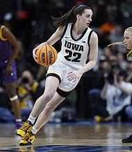 Caitlin Clark of the Iowa Hawkeyes dribbles against Hailey Van Lith of the LSU Tigers at last Monday's NCAA Women's basketball game in Albany, New York.
Mandatory Credit:	Sarah Stier/Getty Images via CNN Newsource