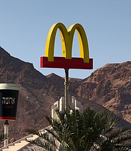 The “Golden Arches" of McDonald’s in the Israeli Dead Sea resort town of Ein Bokek, pictured in March 2021.
Mandatory Credit:	Emmanuel Dunand/AFP/Getty Images/File via CNN Newsource