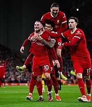 Alexis Mac Allister celebrates after giving Liverpool the lead against Sheffield United.
Mandatory Credit:	Paul Ellis/AFP/Getty Images via CNN Newsource