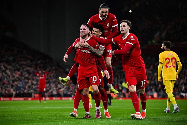 Alexis Mac Allister celebrates after giving Liverpool the lead against Sheffield United.
Mandatory Credit:	Paul Ellis/AFP/Getty Images via CNN Newsource
