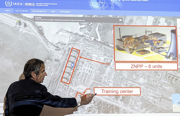 Grossi points on a map of the Zaporizhzhia nuclear power plant, March 2022
Mandatory Credit:	Joe Klamar/AFP/Getty Images/File via CNN Newsource