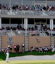 Akshay Bhatia celebrates the birdie putt that forced McCarthy into a playoff, dislocating his shoulder in the process.
Mandatory Credit:	Raj Mehta/Getty Images via CNN Newsource