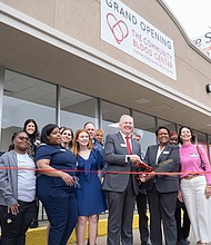 CBC President and CEO John Hagins and Executive Director of Chicago Operations, Samantha Speaks cut the ribbon to officially open the Beverly-based donor center. Photo provided by Rudd Resources.