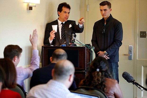 Jack Burkman, a lawyer and Republican operative, and Jacob Wohl, an internet activist, speak during a news conference in Arlington, Virginia, in November 2018.
Mandatory Credit:	Joshua Roberts/Reuters/File via CNN Newsource