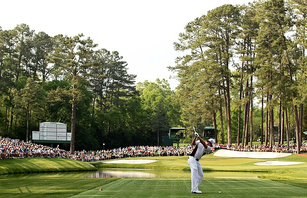 Rory McIlroy drives from the 16th tee during his second round.
Mandatory Credit:	Andrew Redington / Getty Images via CNN Newsource