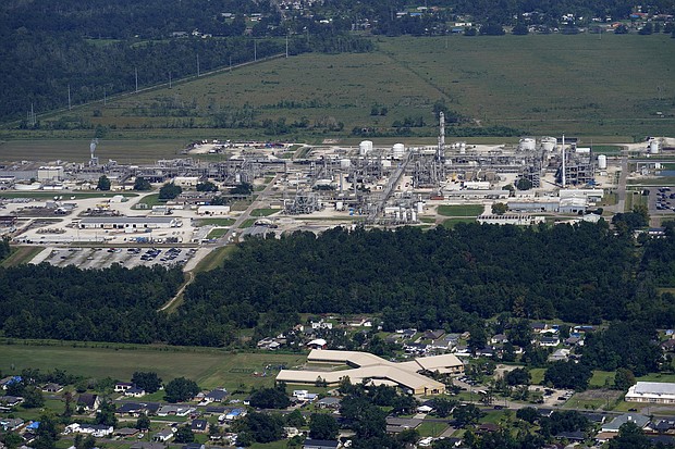 An elementary school and residential neighborhoods sit near the Denka Performance Elastomer Plant in Louisiana. New EPA rules are designed to protect neighborhoods near facilities that release airborne toxins.
Mandatory Credit:	Gerald Herbert/AP/File via CNN Newsource