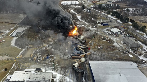 This photo taken with a drone shows portions of a Norfolk Southern freight train that derailed Friday night in East Palestine, Ohio, are still on fire at mid-day on Feb. 4, 2023. The rail company announced it has reached a $600 million settlement with residents affected by the derailment.
Mandatory Credit:	Gene J. Puskar/AP via CNN Newsource