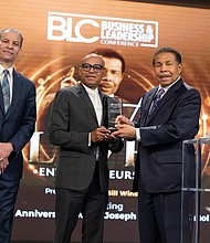 Dr. Bill Winston awards Global Entrepreneur of the Year award to Charles Harrell II. Pictured from left to right, Dave Ramseur, Dean of JBS, Charles Harrell II; and Dr. Bill Winston. Joseph Business School. PRNewsFoto