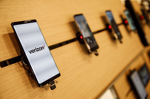 Phones are displayed at a Verizon store in California in a 2018 photo.
Mandatory Credit:	Patrick T. Fallon/Bloomberg/Getty Images via CNN Newsource