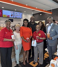 Pictured at the Dunkin Donuts grand opening celebration is Lynwood's Mayor Jada D. Curry the village Clerk, and Trustees. Photo provided by STH Media LLC.
