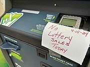 A Virginia Lottery kiosk inside a Henrico County convenience store was deactivated as hundreds of business owners protested for the right to host skill games.