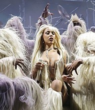 Doja Cat wore an entire outfit, including boots, fashioned out of blonde human hair for both her Coachella sets.
Mandatory Credit:	Frazer Harrison/Getty Images