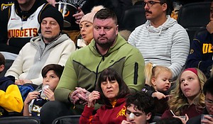 Strahinja Jokić (middle) watches a Denver Nuggets game against the Indiana Pacers on January 14.
Mandatory Credit:	Ron Chenoy/USA TODAY Sports/Reuters via CNN Newsource