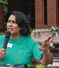 Dr. Colita Fairfax, Alpha Kappa Alpha Mid-Atlantic Archivist and Archives Committee chairperson, speaks during the 50th Chartering Anniversary at VCU on April 20.