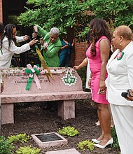 Dr. Lillian H. Gilliam cuts the ribbon to celebrate the sorority’s 50th Chartering Anniversary at VCU.
