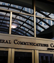 Signage is seen at the headquarters of the Federal Communications Commission in Washington, D.C., in 2020.
Mandatory Credit:	Andrew Kelly/Reuters via CNN Newsource