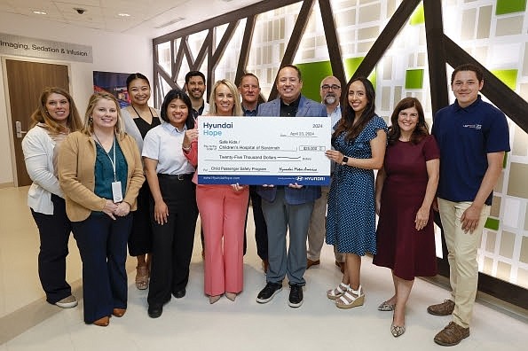 (left to right) Bianca Johnson, Ansley Christain, Hyundai Motor Group Metaplant America, LLC (HMGMA), Ciara Calub, Justine Vitug, Hyundai Motor America, Dr. Michael Bossak, director of hospital medicine, Heather Newsome, administrator, Memorial Health Dwaine & Cynthia Willett Children’s Hospital of Savannah, Mike Donahoo, senior manager, Brandon Ramirez, director, corporate social responsibility, Hyundai Motor America, Joe LaMuraglia, HMGMA, Vanessa Perez, Hyundai Motor America, Kristen King, manager of child life, Jadan Santoyo, safe kids program coordinator, Memorial Health Dwaine & Cynthia Willett Children’s Hospital at Memorial Health Dwaine & Cynthia Willett Children’s Hospital of Savannah in Savannah, Ga. on April 23, 2024. (Photo/Hyundai)