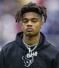 Houston Texans wide receiver Tank Dell, seen here in December 2023, was injured on April 29 during a shooting in Sanford, Florida.
Mandatory Credit:	Eric Christian Smith/AP via CNN Newsource