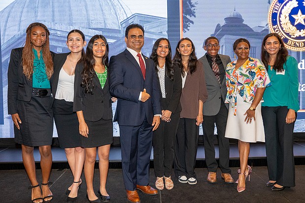 FBC Youth Leadership Pictured: (L-R): Alixandra Reed, Celeste Gutierrez, Aliza Khimani, Judge KP George, Anjana Mathew, Hana Hussain, and Chad Reed