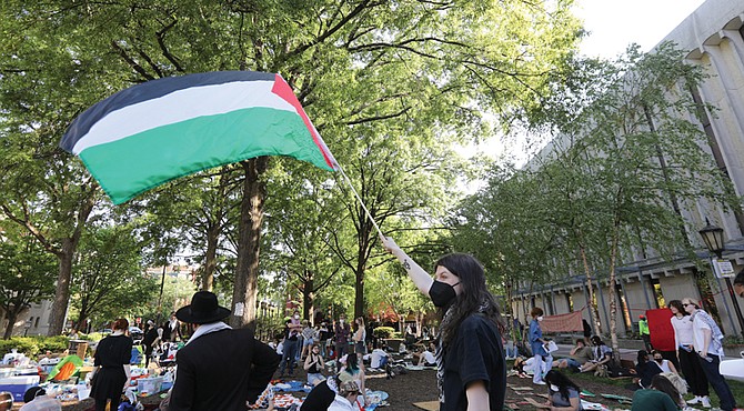 Virginia Commonwealth University students set up a “Liberated Zone for Palestine” on Monday beside the John Branch Cabell Library. Students and community activists gathered together making signs and expressing their views. Police were deployed to the protest later that evening, making several arrests.