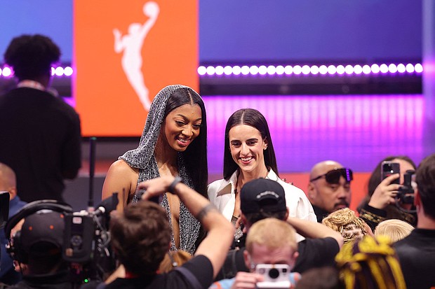 Angel Reese and Caitlin Clark pose for photos ahead of the 2024 WNBA Draft last month.
Mandatory Credit:	Brad Penner/USA Today Sports/Reuters via CNN Newsource
