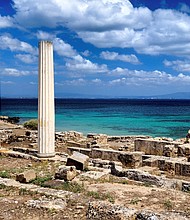 Is Benas beach, halfway up Sardinia’s west coast, is set to become a destination for naturist weddings. Pictured are the Roman ruins of Tharros in Sardinia, Italy.
Mandatory Credit:	Education Images/Universal Images Group Editorial/Getty Images via CNN Newsource