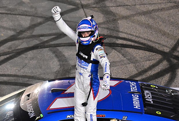 Larson celebrates after the dramatic finish.
Mandatory Credit:	Logan Riely/Getty Images via CNN Newsource